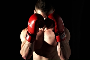 MMA fighters in a ring with betting odds overlay