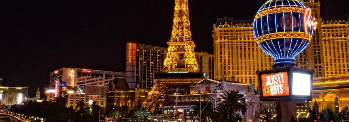 Police car lights outside a casino building at night