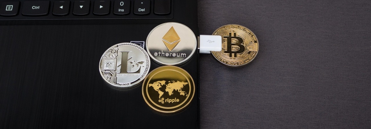 Person holding smartphone with crypto chart