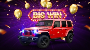 Red jeep wrangler with winning writing and symbols