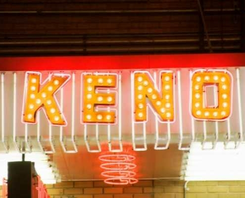 a neon sign with a word keno